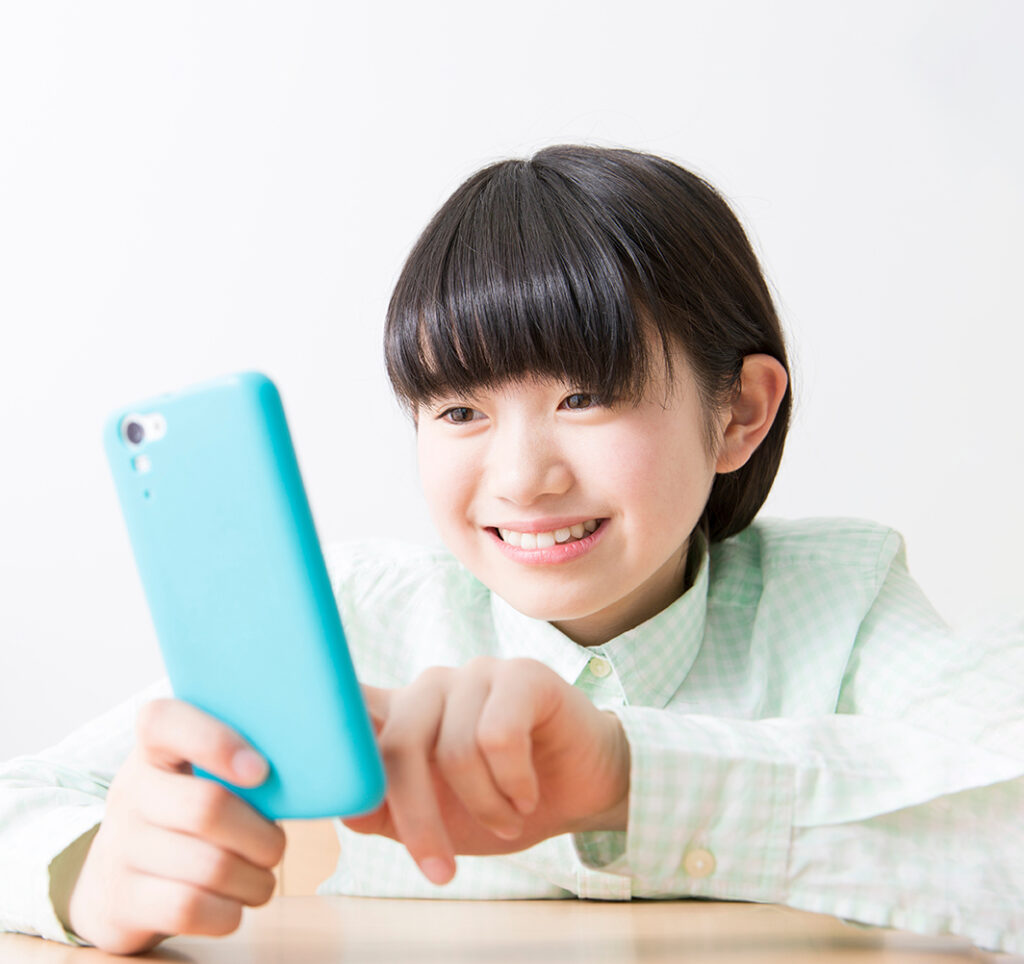 Next Gen girl on her cell phone.